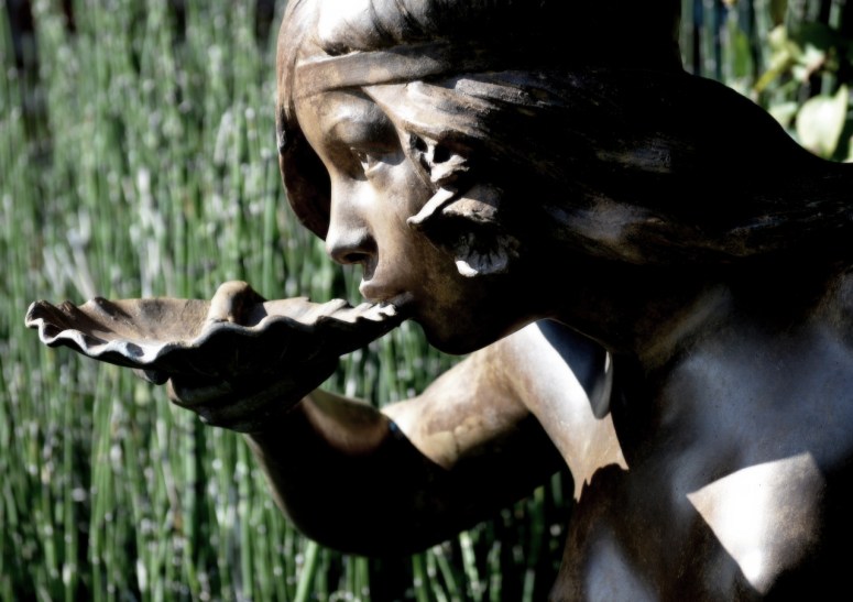 girl-drinking-from-a-shell-det-2-sat-44